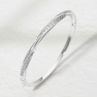 Rhodium Plated CZ Pave Twist Hinged Bangle Bracelet