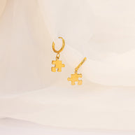 Puzzle Piece Huggie Hoops