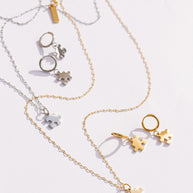Puzzle Piece Huggie Hoops